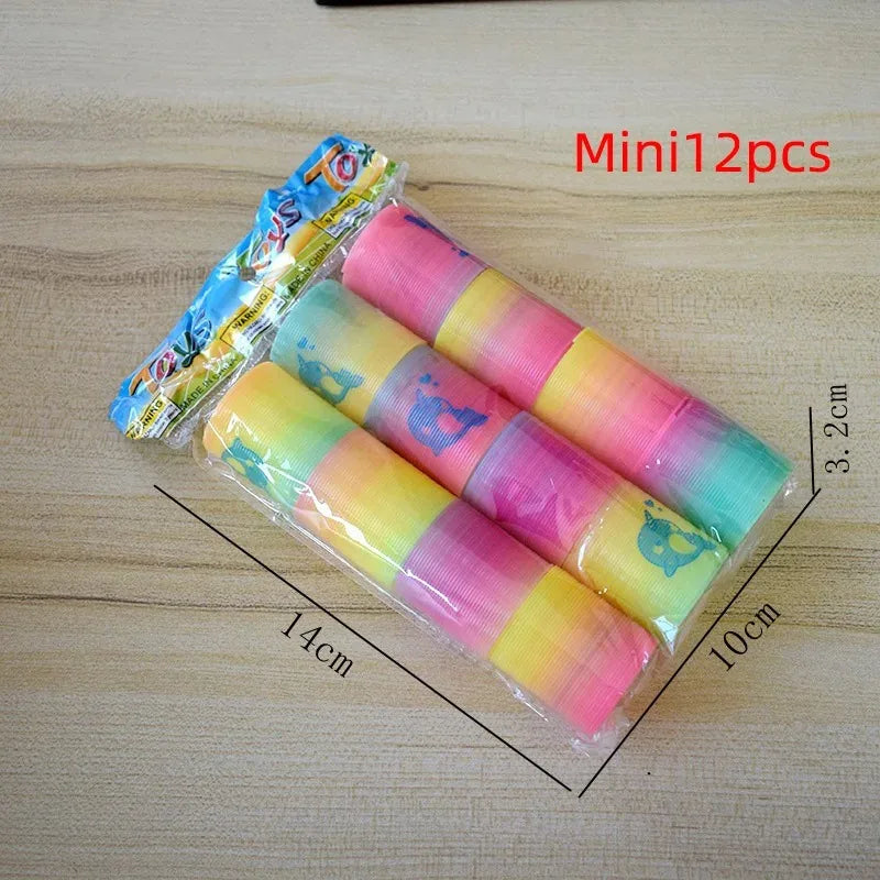 24PCS Rainbow Magic Springs Circle Toys Kids Birthday Party Favors Gifts