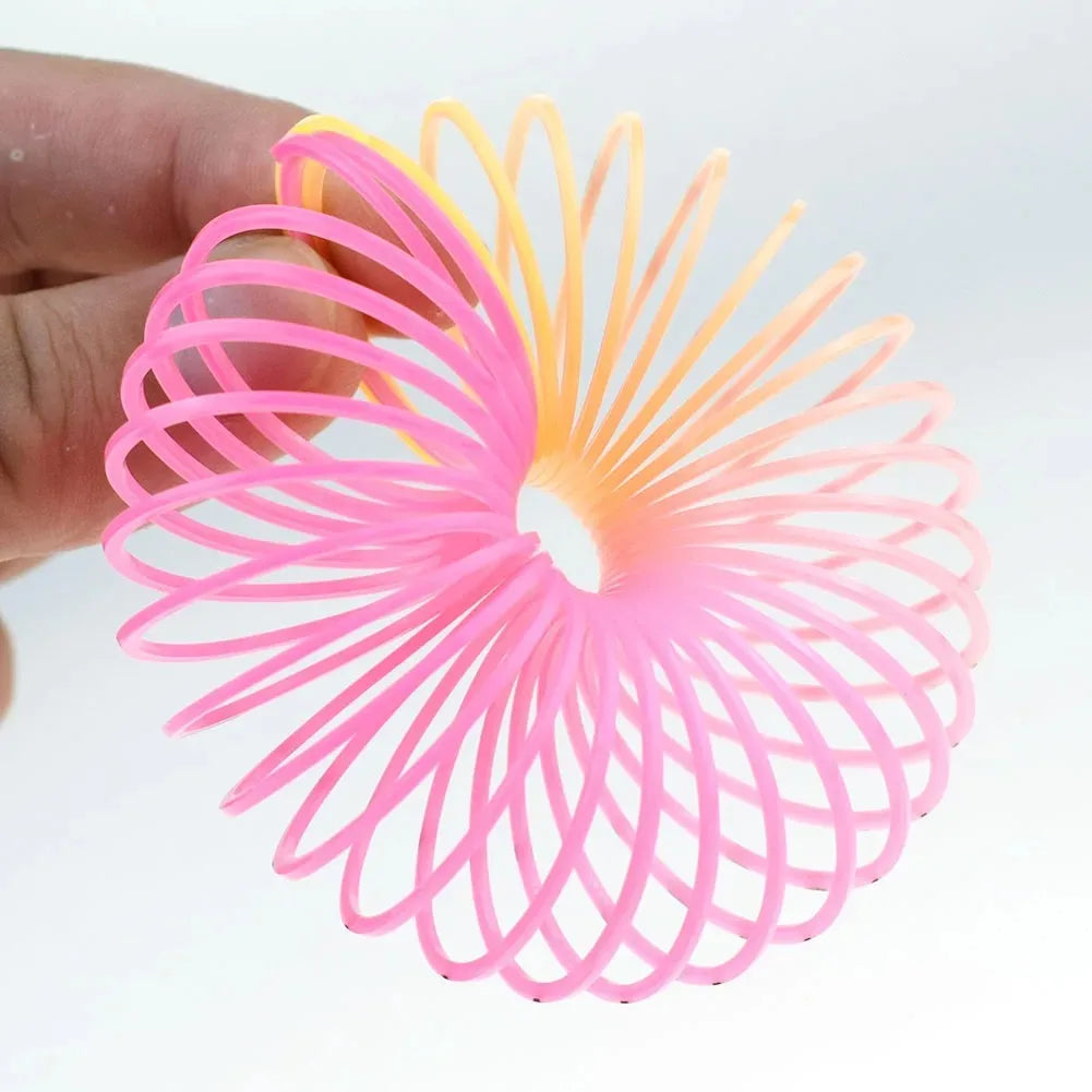 24PCS Rainbow Magic Springs Circle Toys Kids Birthday Party Favors Gifts