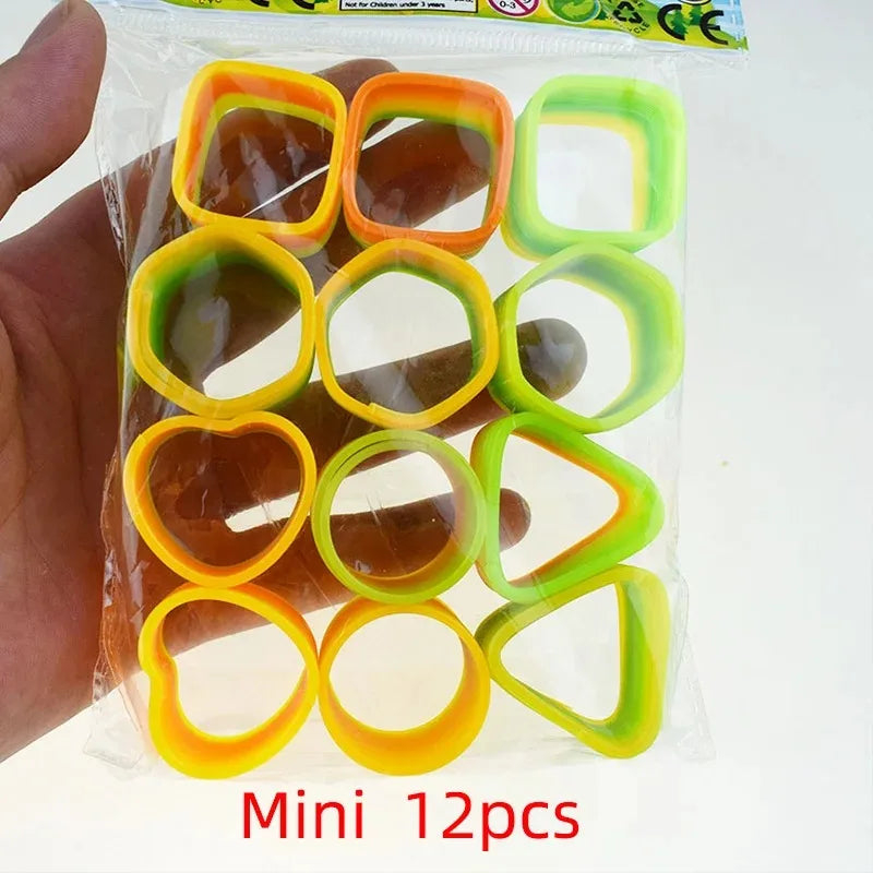 24PCS Rainbow Magic Springs Circle Toys Kids Birthday Party Favors Gifts