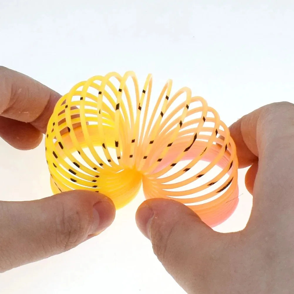 24PCS Rainbow Magic Springs Circle Toys Kids Birthday Party Favors Gifts