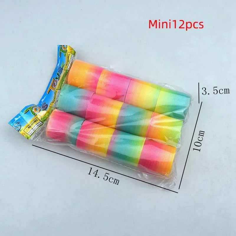24PCS Rainbow Magic Springs Circle Toys Kids Birthday Party Favors Gifts