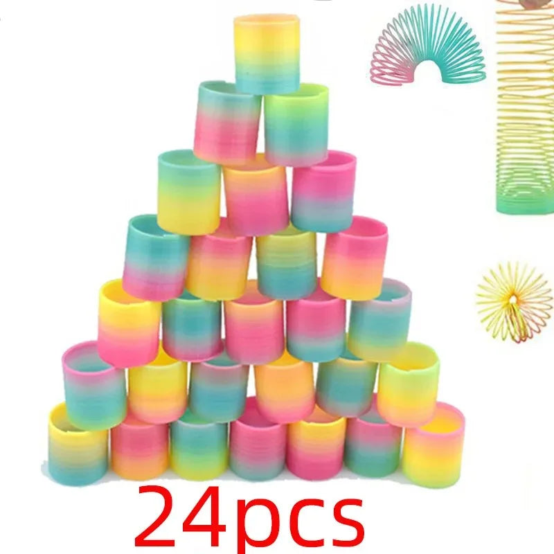 24PCS Rainbow Magic Springs Circle Toys Kids Birthday Party Favors Gifts